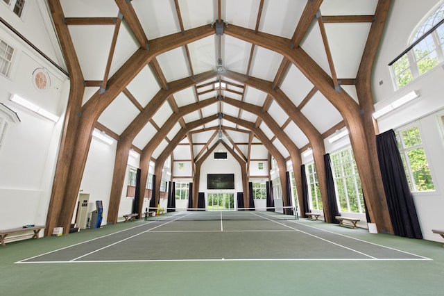 view of tennis court featuring basketball court