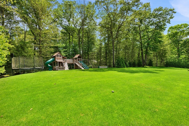 9 Cowdray Park Dr, Greenwich, CT 06831 - view of yard featuring a trampoline and a playground