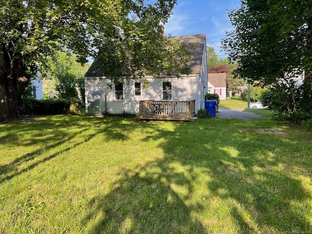 23 Nassau Cir E, Hartford, CT 06118 - view of green lawn featuring a deck