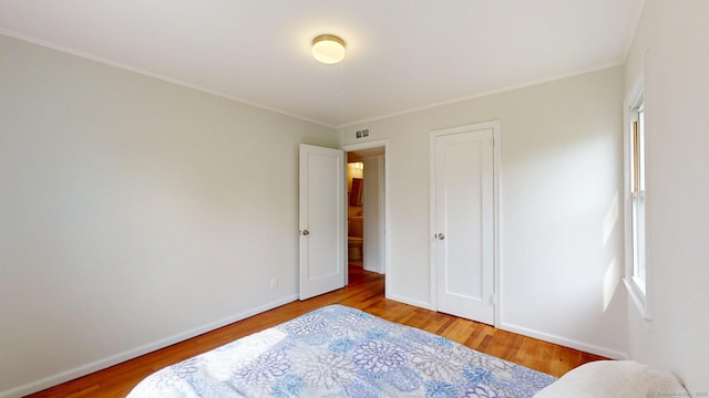 23 Nassau Cir E, Hartford, CT 06118 - bedroom with wood finished floors and ornamental molding