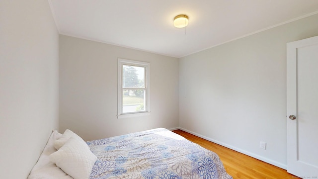 23 Nassau Cir E, Hartford, CT 06118 - bedroom with wood finished floors and crown molding