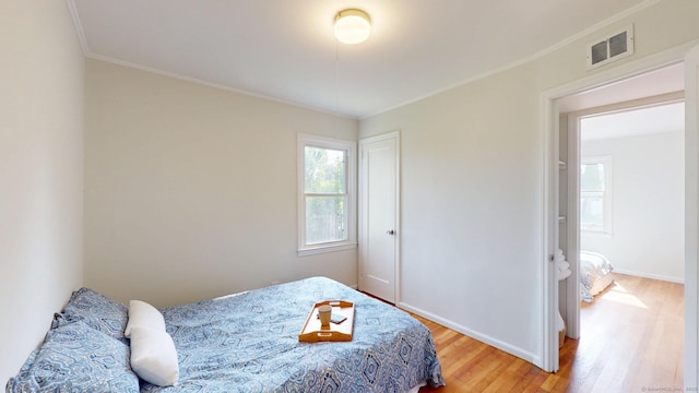 23 Nassau Cir E, Hartford, CT 06118 - bedroom featuring crown molding and wood finished floors