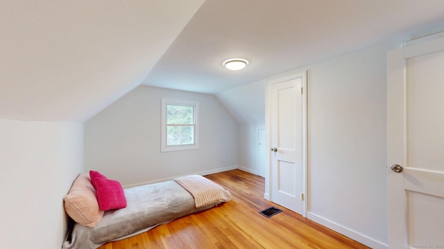 23 Nassau Cir E, Hartford, CT 06118 - bedroom with wood finished floors and lofted ceiling
