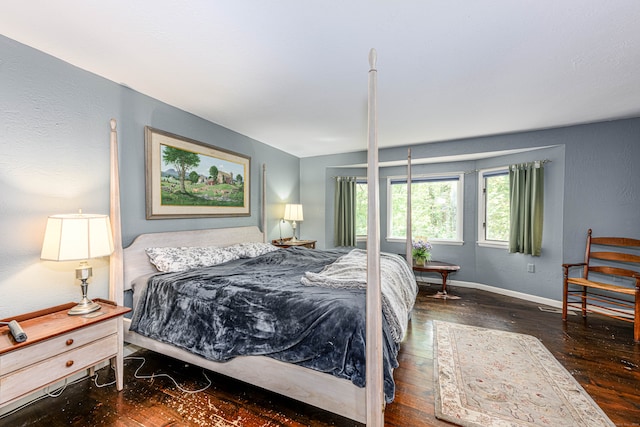 bedroom featuring dark wood-type flooring