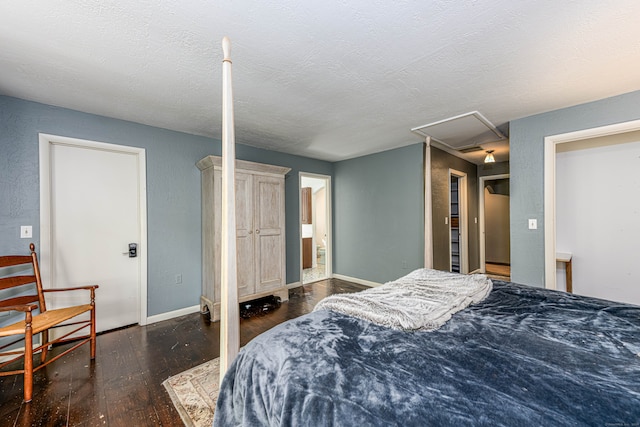 bedroom with dark hardwood / wood-style flooring