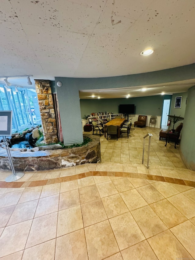 interior space featuring light tile patterned floors