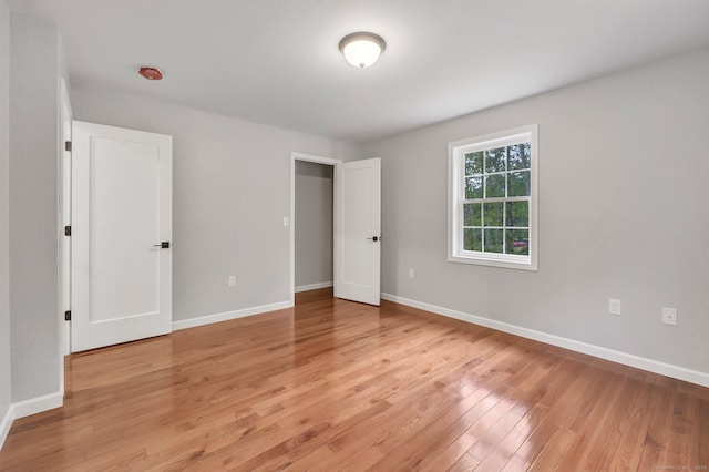 unfurnished bedroom with light hardwood / wood-style floors