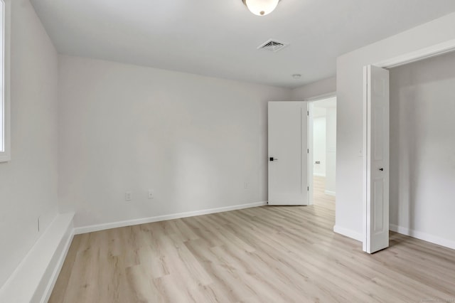 unfurnished bedroom featuring light hardwood / wood-style flooring