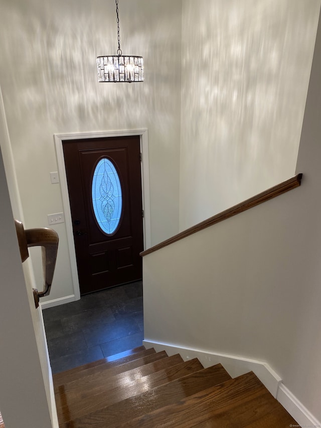 entryway with dark wood-type flooring