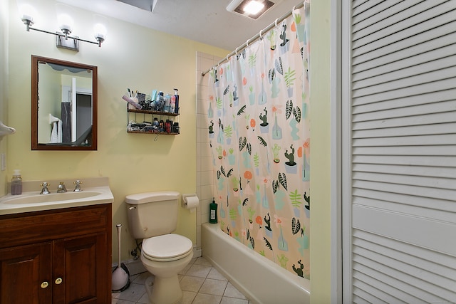 full bathroom featuring vanity, shower / bath combination with curtain, toilet, and tile patterned flooring