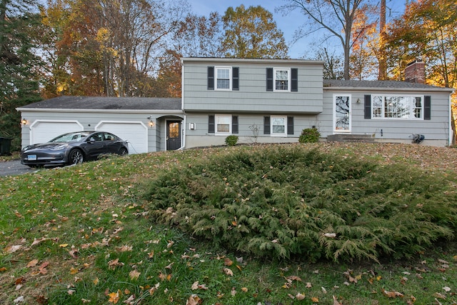 tri-level home featuring a garage