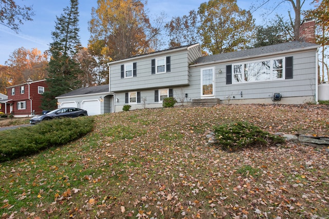 split level home with a garage