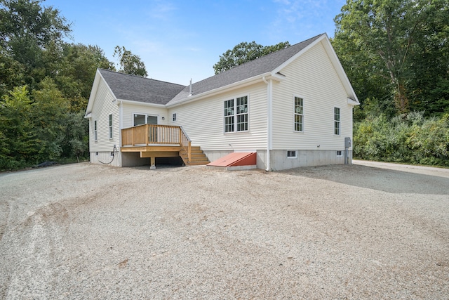 view of front facade featuring a wooden deck