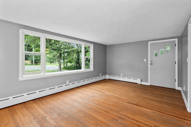 251 Stevens St, Bristol, CT 06010 - unfurnished room with a baseboard radiator and light wood-type flooring