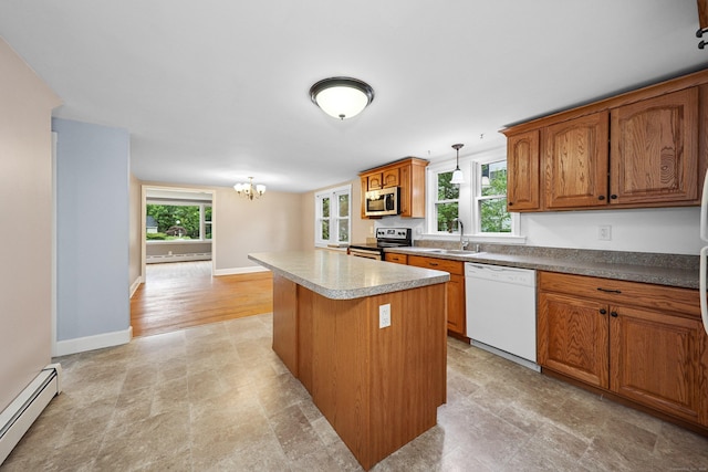 251 Stevens St, Bristol, CT 06010 - kitchen featuring appliances with stainless steel finishes, a baseboard radiator, baseboard heating, a center island, and a chandelier