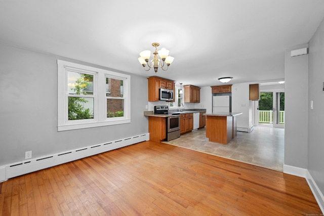 251 Stevens St, Bristol, CT 06010 - kitchen featuring appliances with stainless steel finishes, brown cabinetry, baseboard heating, a chandelier, and light wood-type flooring