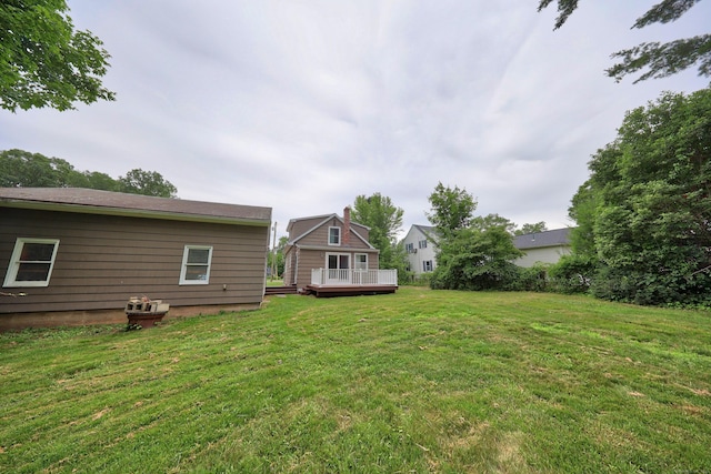 251 Stevens St, Bristol, CT 06010 - view of grassy yard featuring a wooden deck