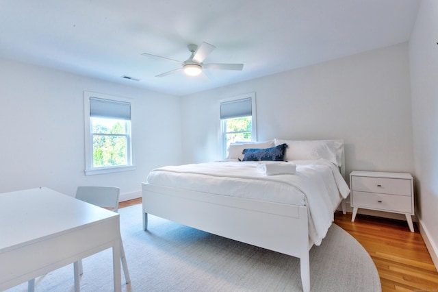 82 Thimble Island Rd, Branford, CT 06405 - bedroom with light wood-type flooring and ceiling fan
