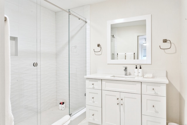 bathroom featuring vanity and walk in shower