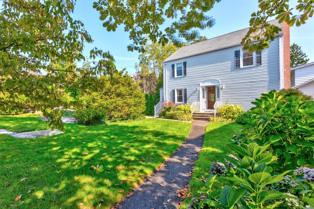 82 Thimble Island Rd, Branford, CT 06405 - view of front of property with a front lawn and a chimney