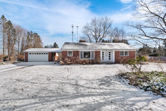 single story home featuring a garage