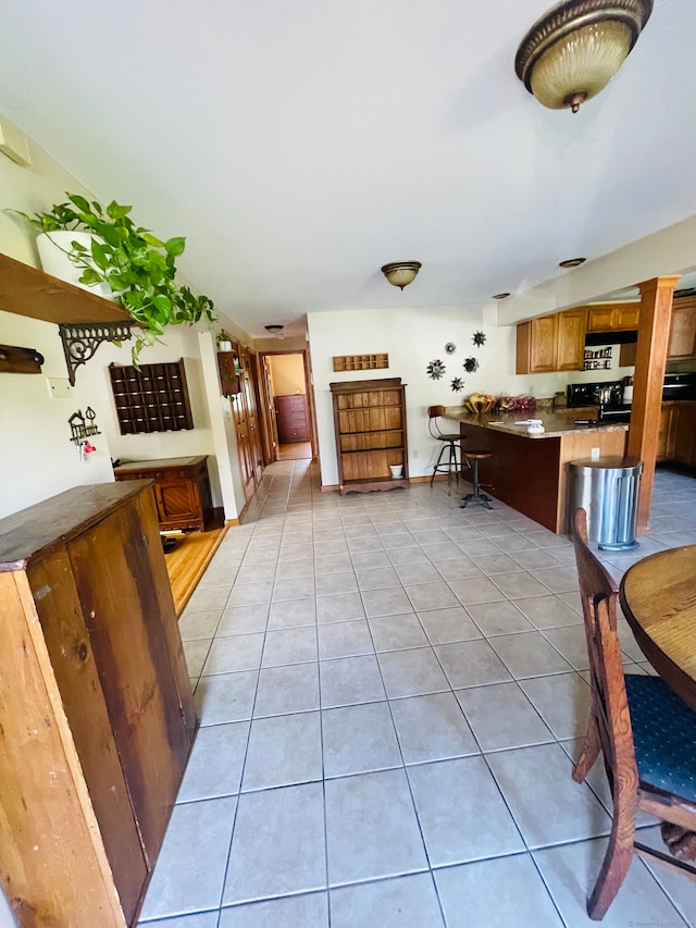 interior space with light tile patterned flooring