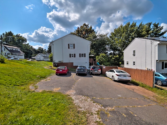 view of front of home with a front lawn