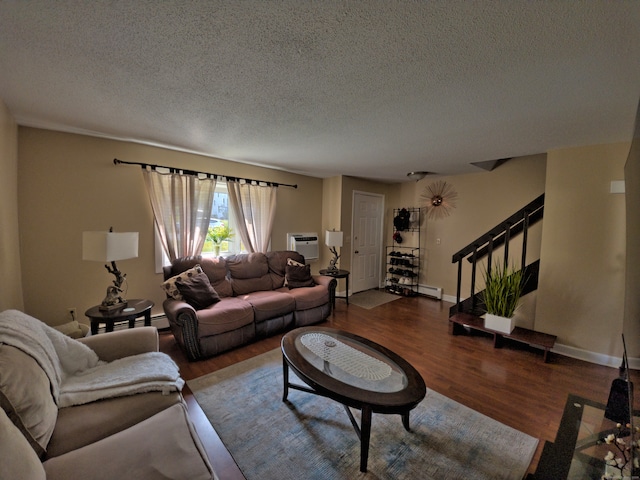 living room with a textured ceiling, an AC wall unit, hardwood / wood-style floors, and a baseboard radiator