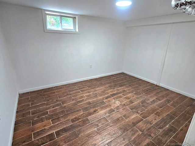 basement with dark wood-type flooring