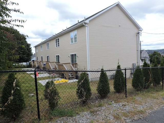 view of property exterior featuring a yard