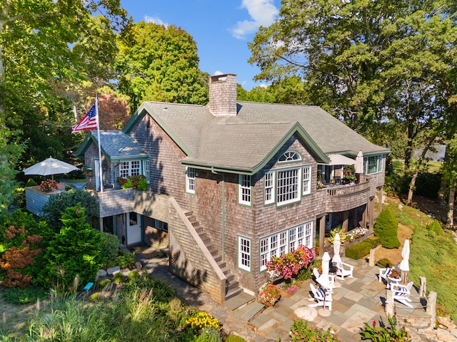 rear view of property with a patio area