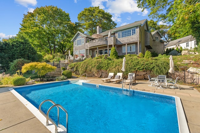 view of pool with a patio