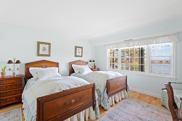 bedroom featuring light wood-type flooring