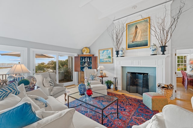 living room featuring high vaulted ceiling, wood-type flooring, and beamed ceiling