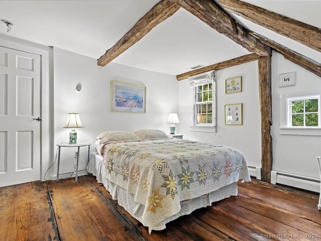 bedroom with multiple windows, baseboard heating, and dark hardwood / wood-style floors