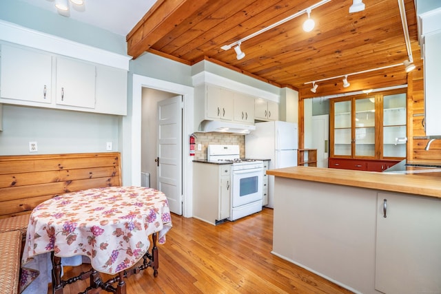 kitchen featuring decorative backsplash, light wood-type flooring, wood ceiling, white range with gas cooktop, and white cabinetry