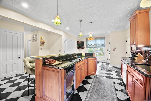 kitchen with pendant lighting, wine cooler, dishwasher, a center island, and crown molding