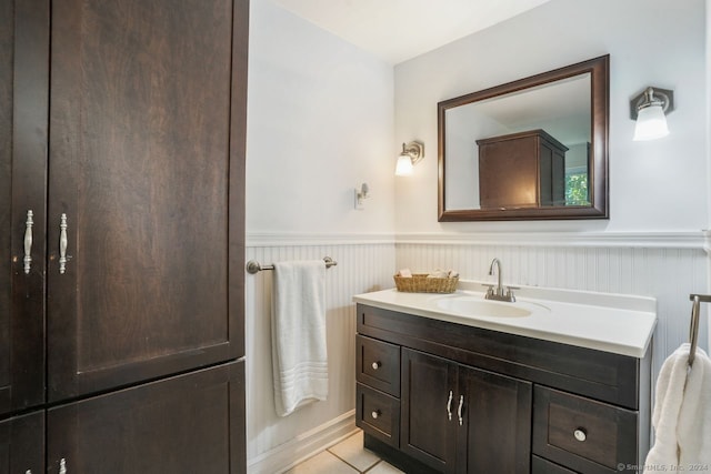 bathroom with vanity and tile patterned flooring