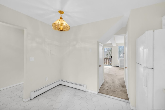 unfurnished dining area with an inviting chandelier, a baseboard radiator, and light colored carpet