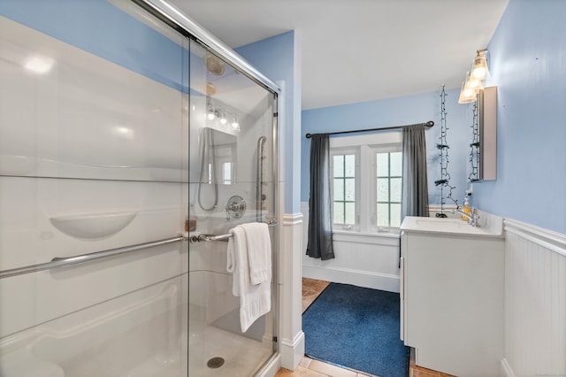 bathroom with vanity and an enclosed shower