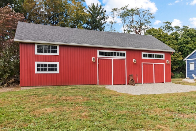 view of outdoor structure with a yard