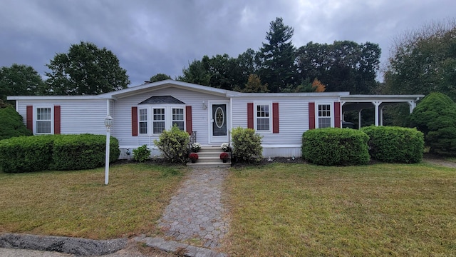 1 Circle Dr, Windham, CT 06256 - manufactured / mobile home featuring a front lawn