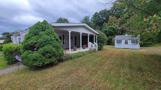 1 Circle Dr, Windham, CT 06256 - back of house with a yard and an outdoor structure