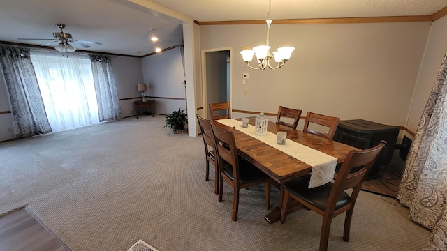 1 Circle Dr, Windham, CT 06256 - dining space featuring ornamental molding, light colored carpet, and ceiling fan with notable chandelier