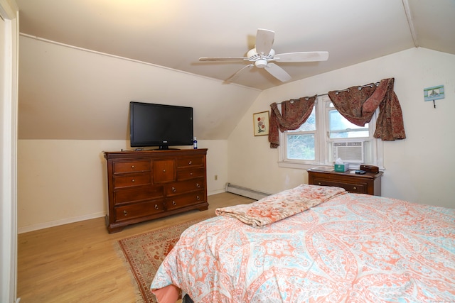 bedroom with vaulted ceiling, baseboard heating, light wood-type flooring, cooling unit, and ceiling fan