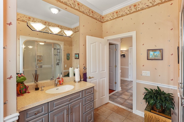 bathroom featuring ornamental molding, tile patterned flooring, vanity, and a shower with shower door