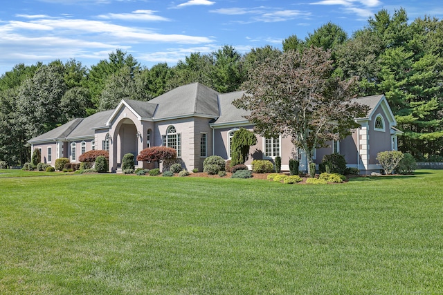 view of front of home with a front yard