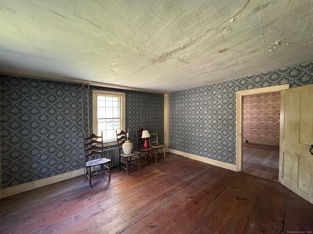 5 Balance Rock Rd, Hartland, CT 06027 - living area with hardwood / wood-style floors, radiator, and wallpapered walls