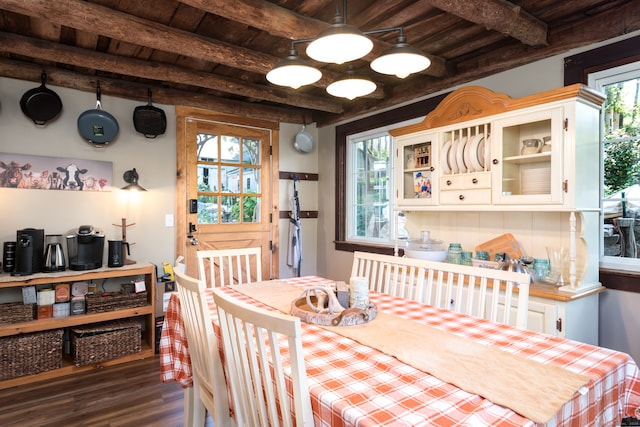 dining space with beamed ceiling, wooden ceiling, and plenty of natural light