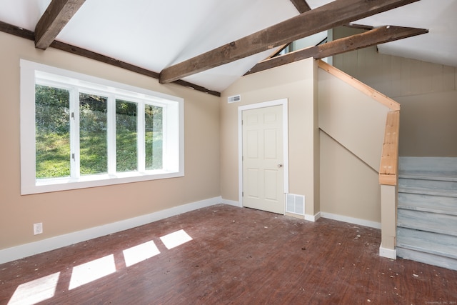 bonus room featuring dark wood-type flooring and vaulted ceiling with beams